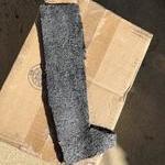 Sprayed the adhesive on the back side of the carpe